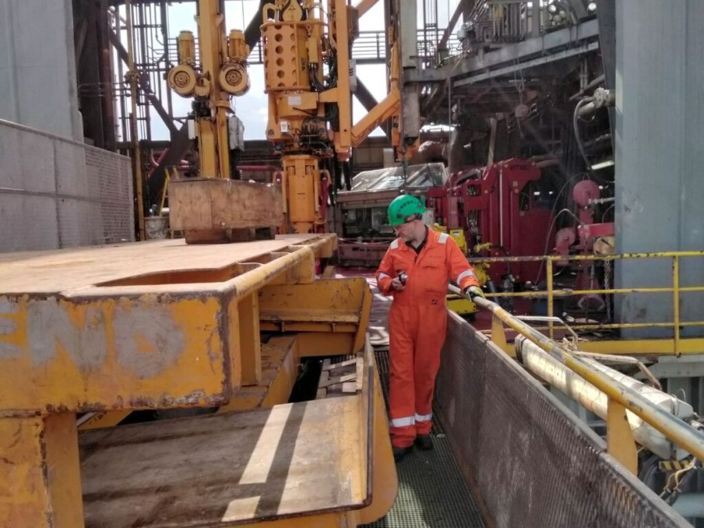 ModuSpec surveyor inspecting equipment